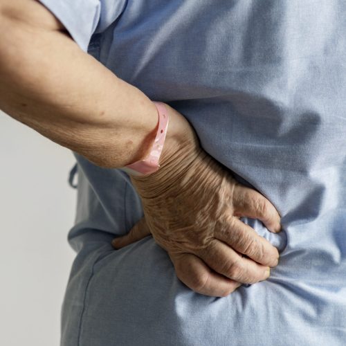 Elderly woman with back pain